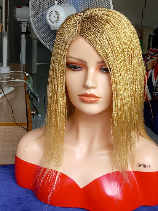 This beautiful blonde micro twist wig is a must-have for every woman. Available in different colors with free shipping on our website - BRAIDED WIG BOSS